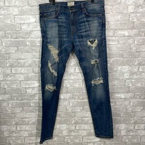 SYNDICATE Distressed Slim Tapered Leg Jeans